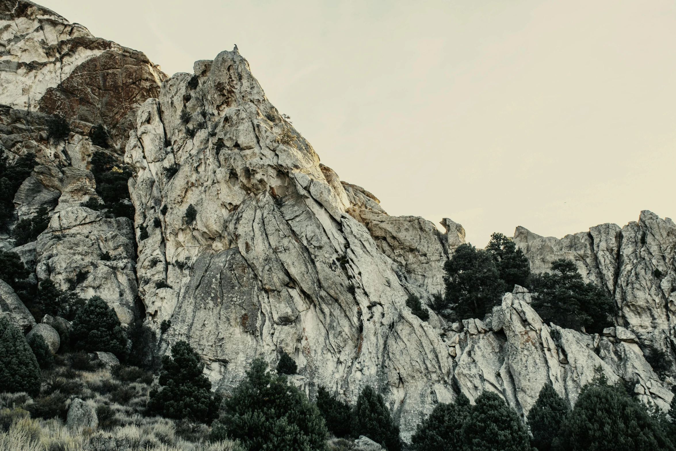 the rock formations look like they are reaching up to the sky