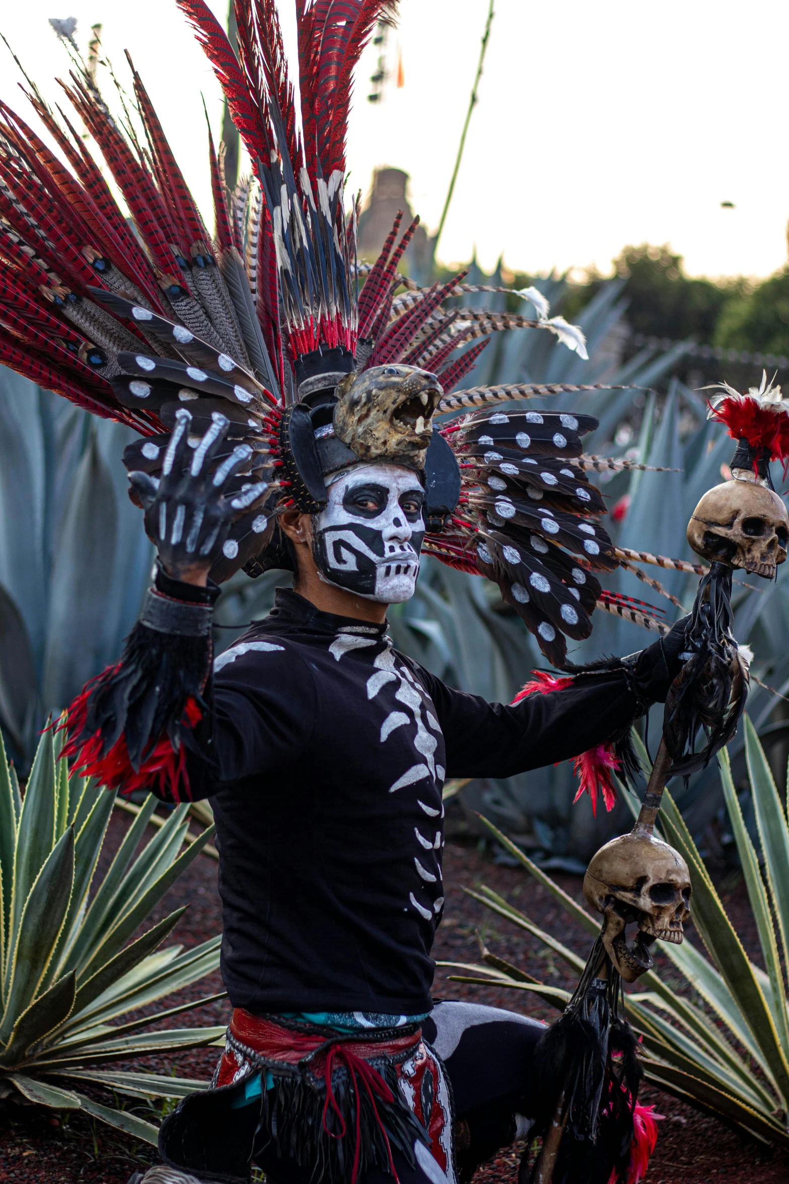 two people dressed up as skeleton skeletons, with skull decorations