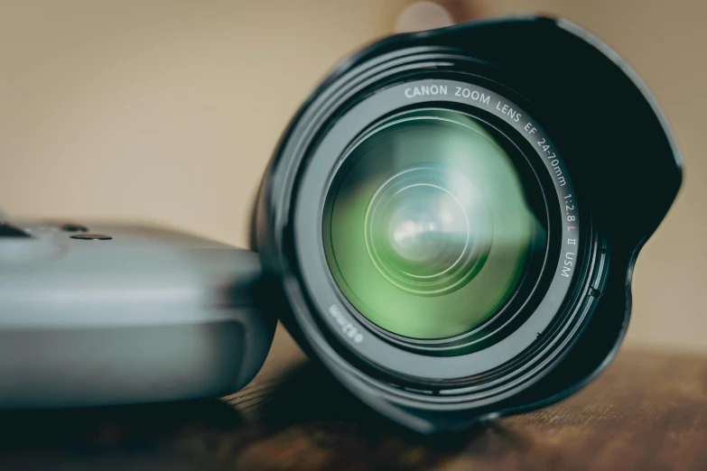 the reflection in the camera lens shows it is made of metal