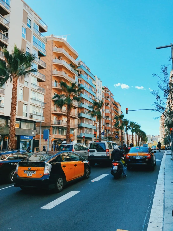 a city street with some very tall buildings