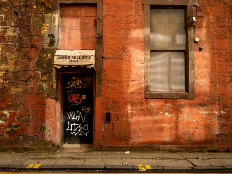 a door is open with the graffiti all over it