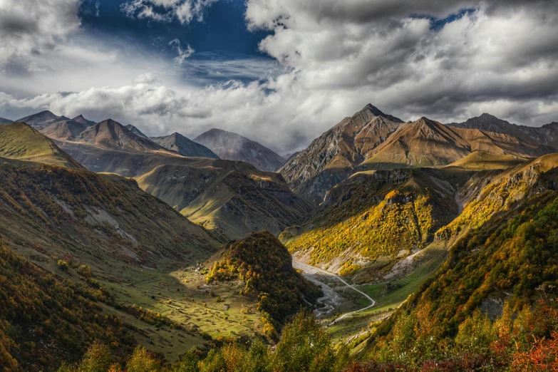 some very pretty mountains with some trees in the background