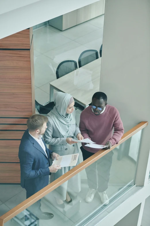 three people in a business meeting