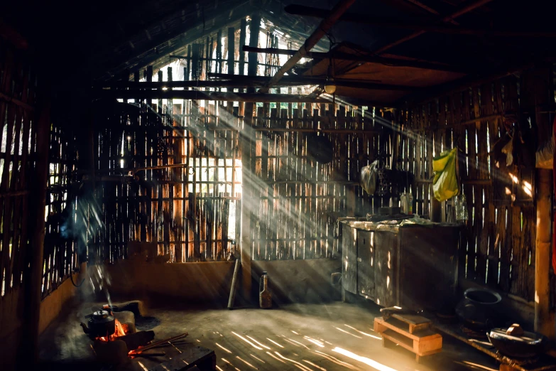 a room is lit by sunlight shining through the wall