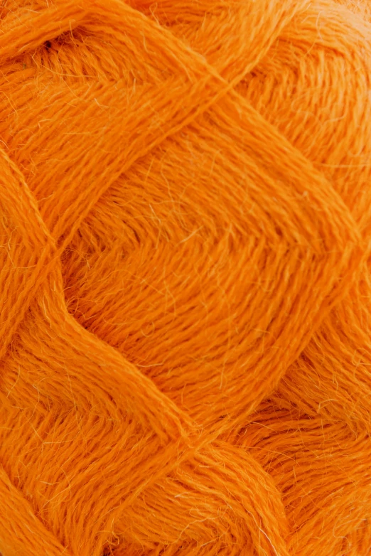 yarn is being spooled together to be used for knitting