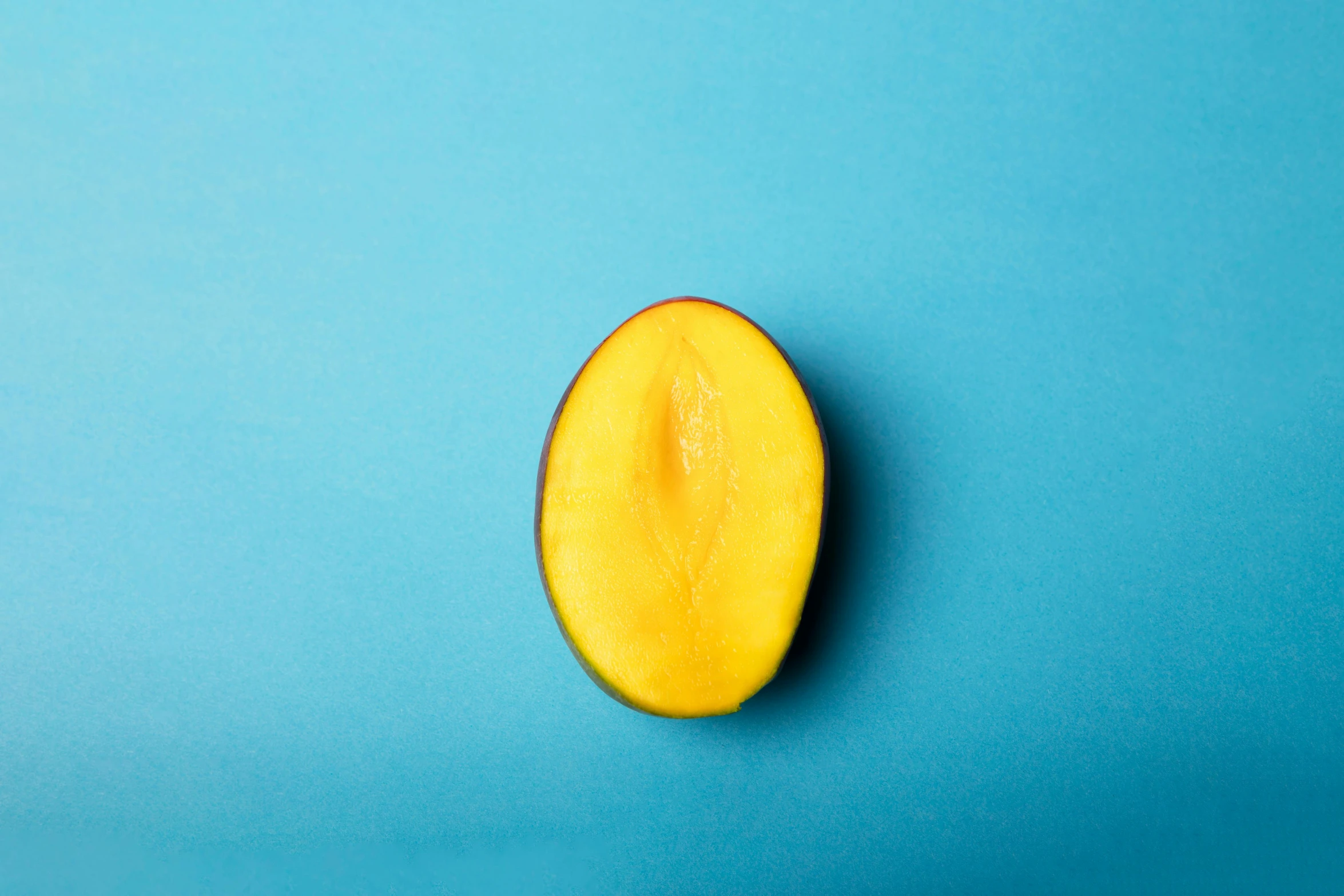 this yellow object has some sort of an orange slice