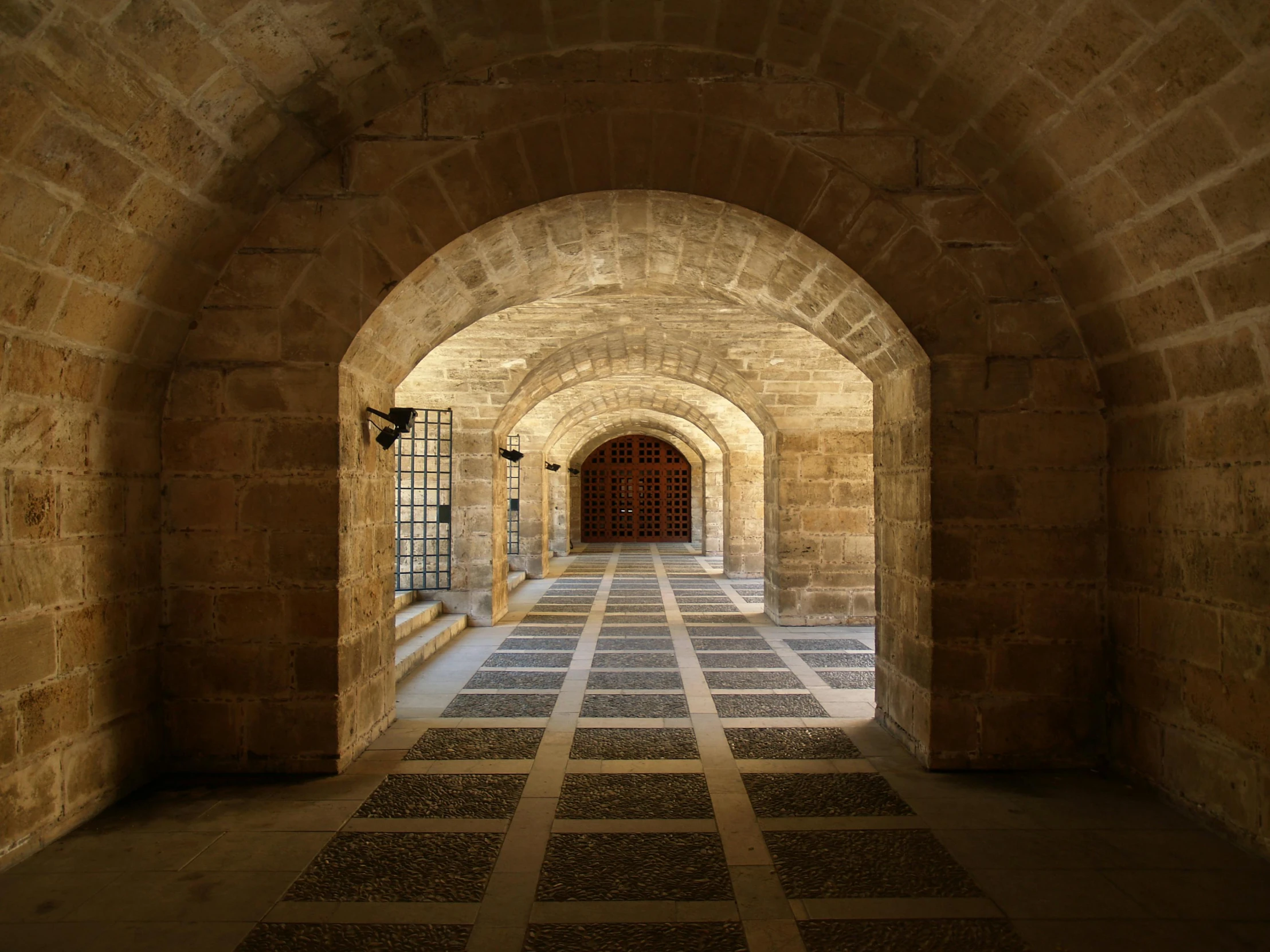 a very long hallway with some stairs in it