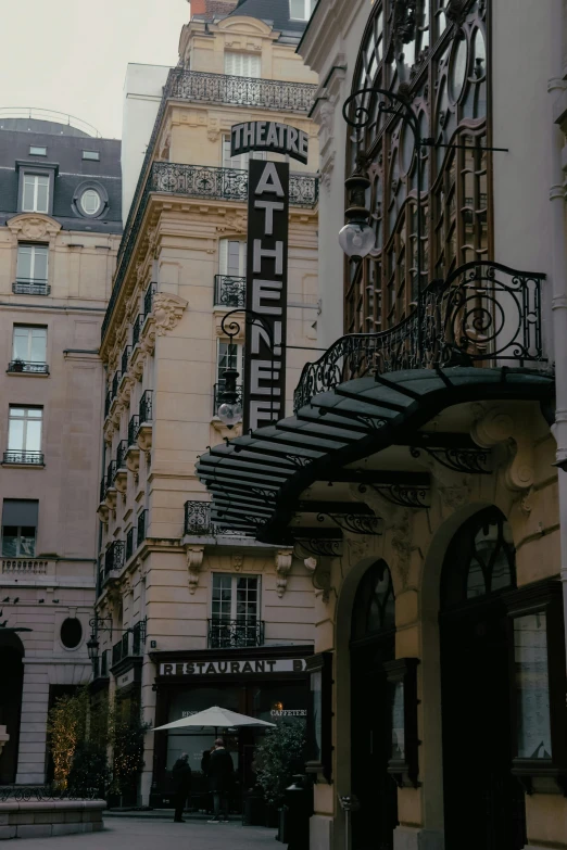 there are several ornate buildings with black awnings