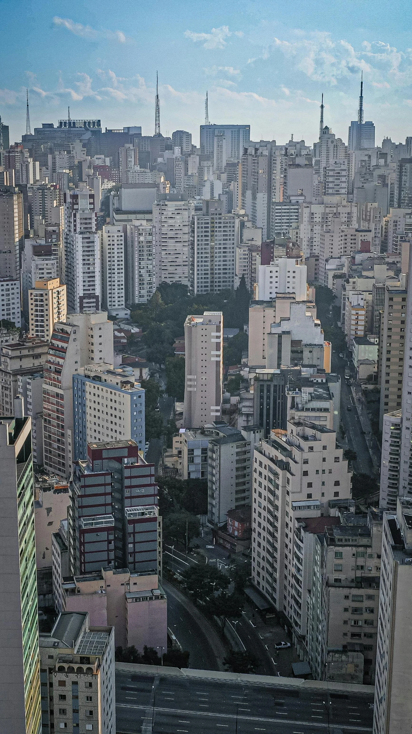 a view of many large city buildings from high above