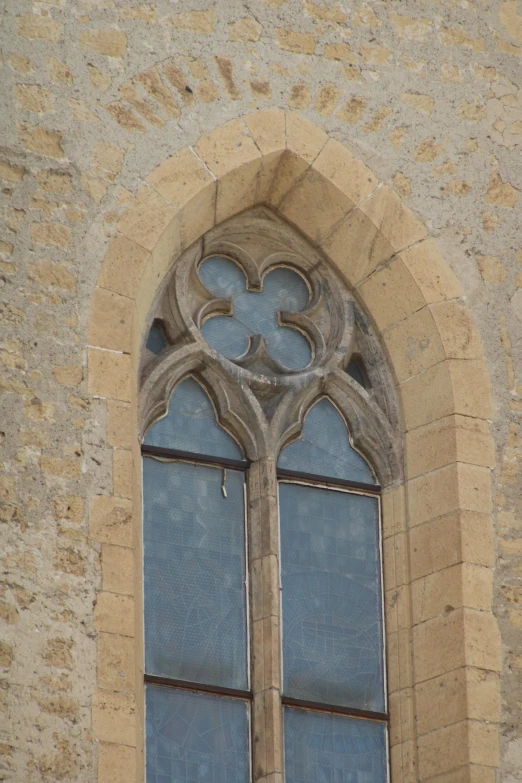a window with a decorative frame and decoration