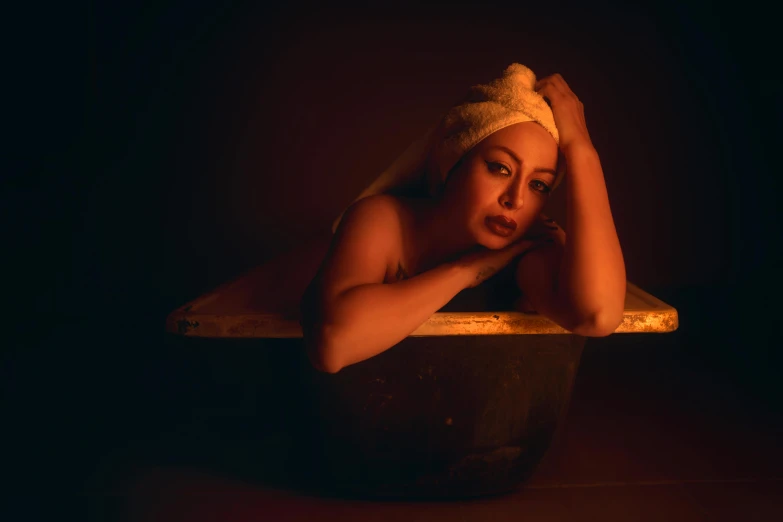 a woman is leaning on the edge of a table