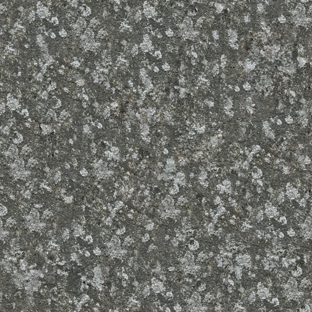 the surface of an old, dark gray carpet with little flowers