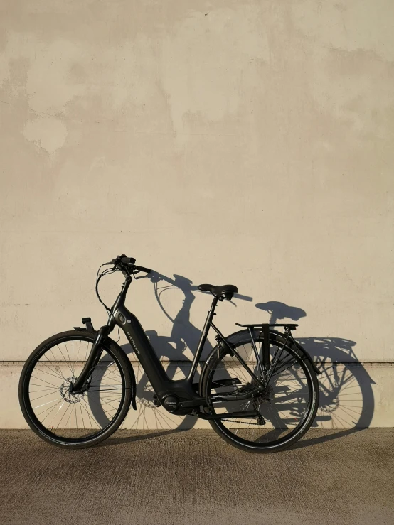 a bicycle parked next to a building