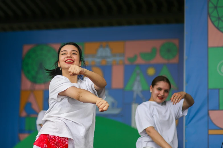 two people performing some type of dance