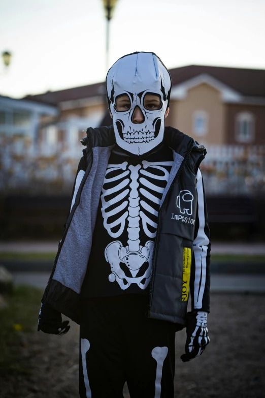 a person in a skeleton costume is standing