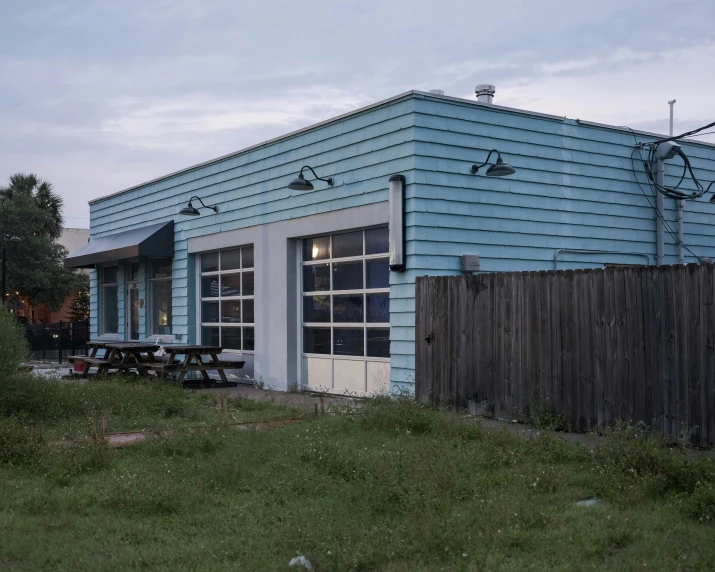 a building with a picnic table next to it