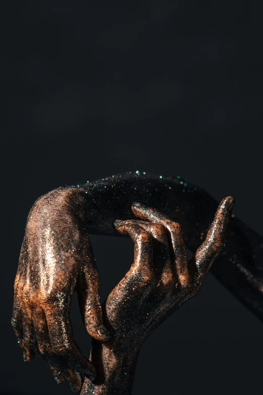 a hand is holding a chain with its hands