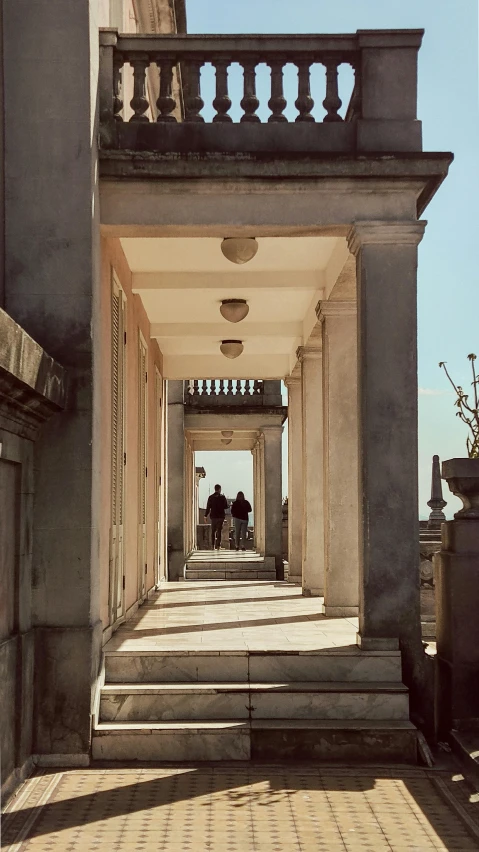 a walkway with many steps to an apartment