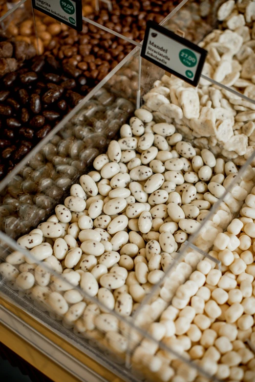 a container filled with white and brown nuts