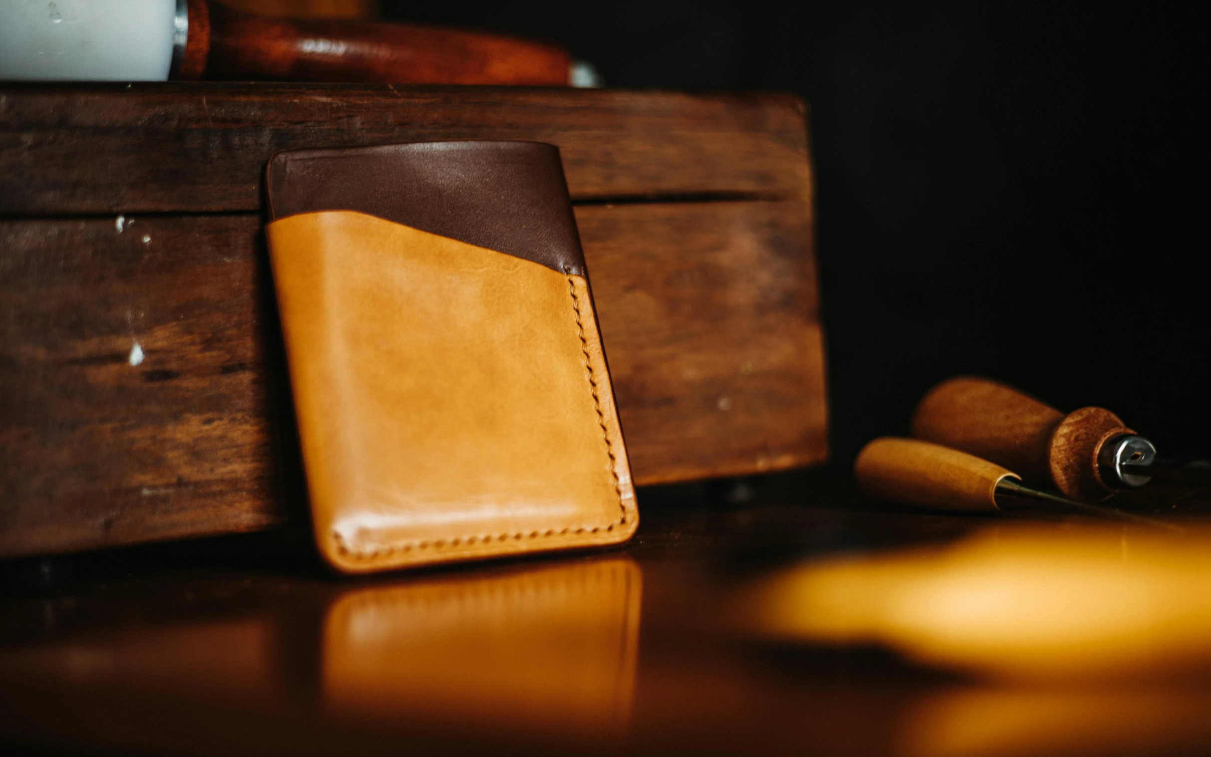 some brown leather is laying next to other brown and yellow things