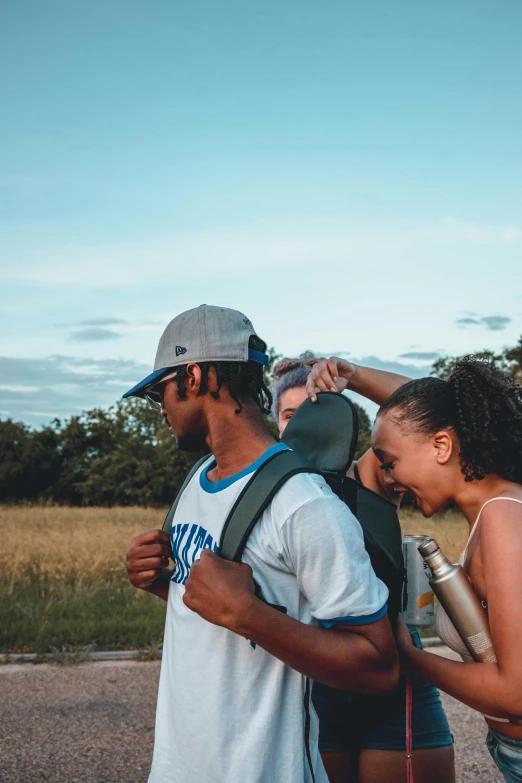 a man and woman standing next to each other