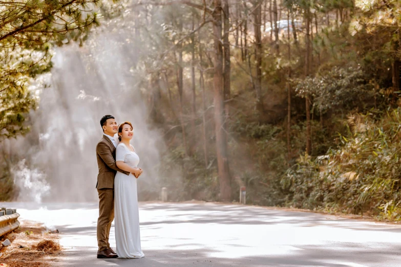 an image of a newly married couple in front of a steam powered geyser