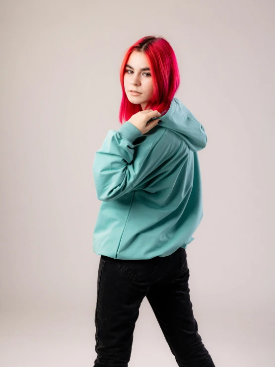  with red hair and green sweatshirt on