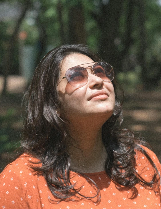 a close up of a person wearing sunglasses