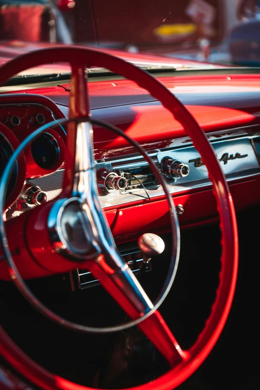 the dash board of an old fashioned car