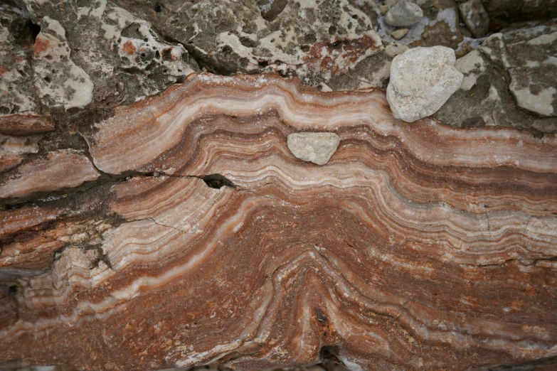 a rock is shown with a rock formation in it