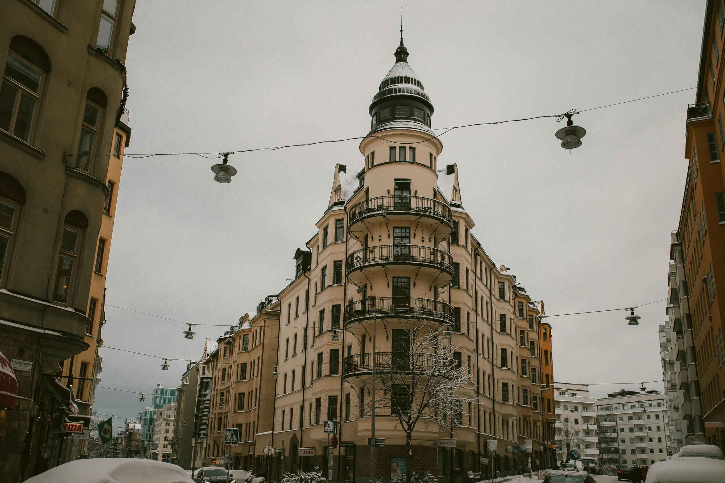 a street scene of a large building in a city