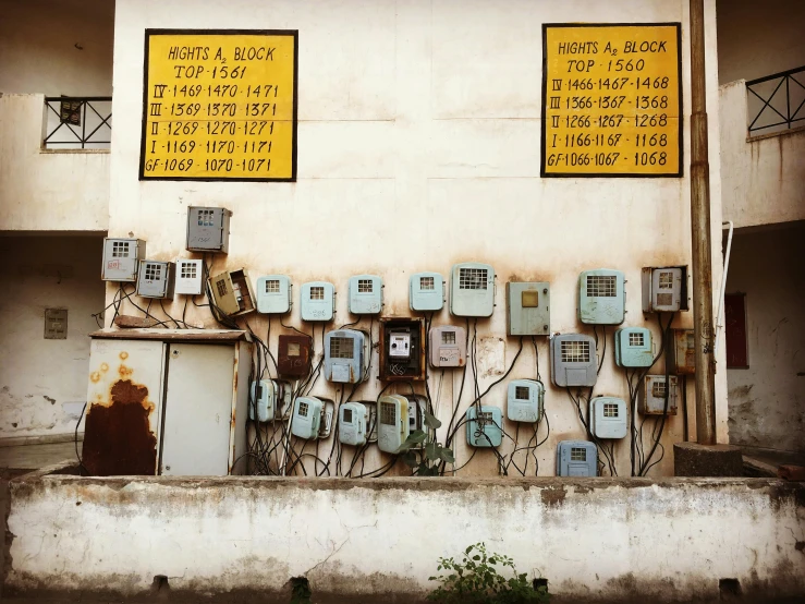 two rows of old style phone poles and wires