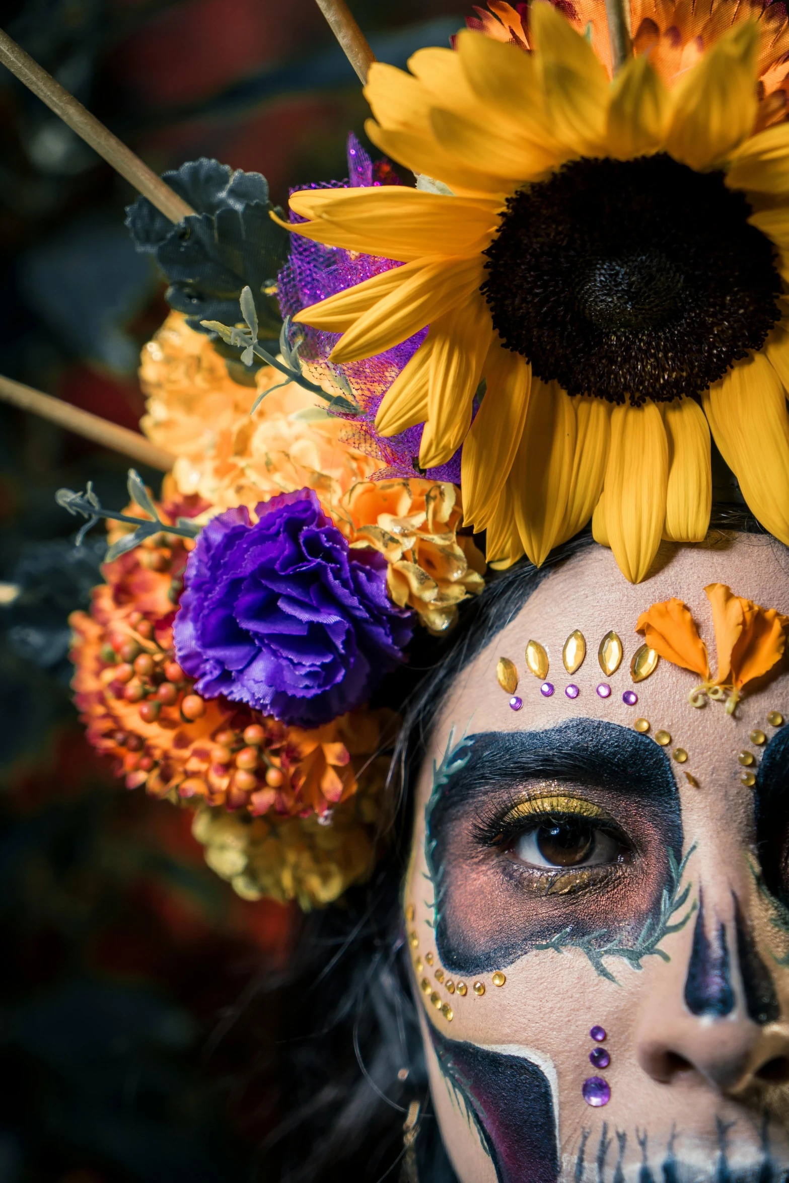 a close up of a person wearing face paint