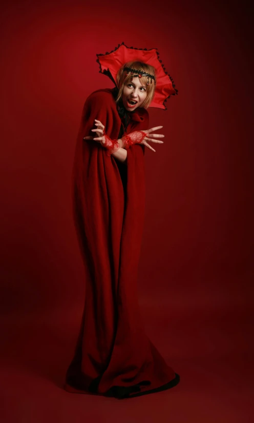 a woman in red and red dress posing