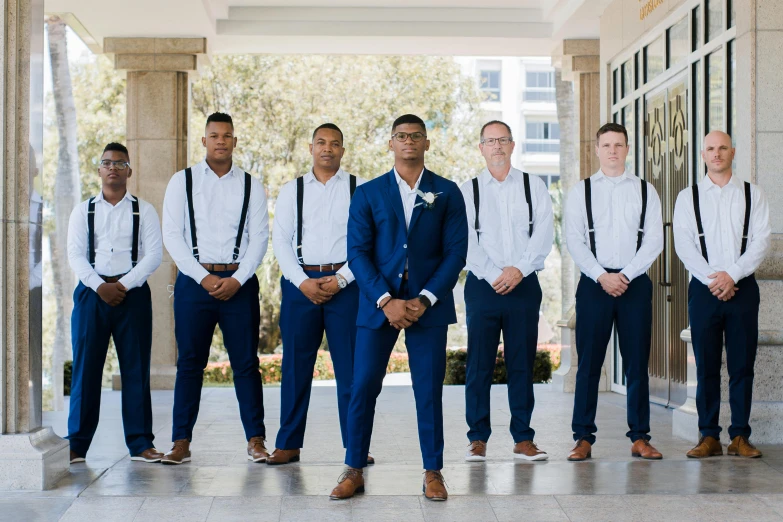 a group of men in suits and ties