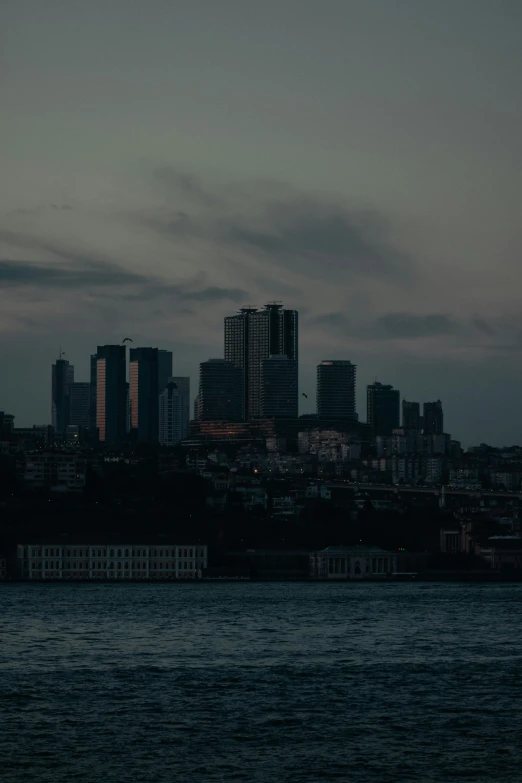 the view from a large body of water at night