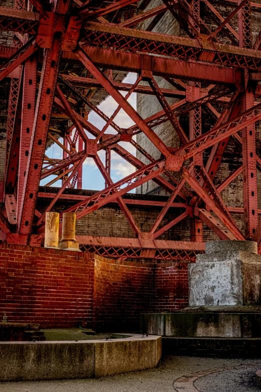 looking up through the sides of a bridge