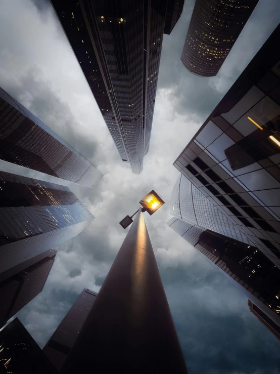 looking up at the skyscrs and street lights