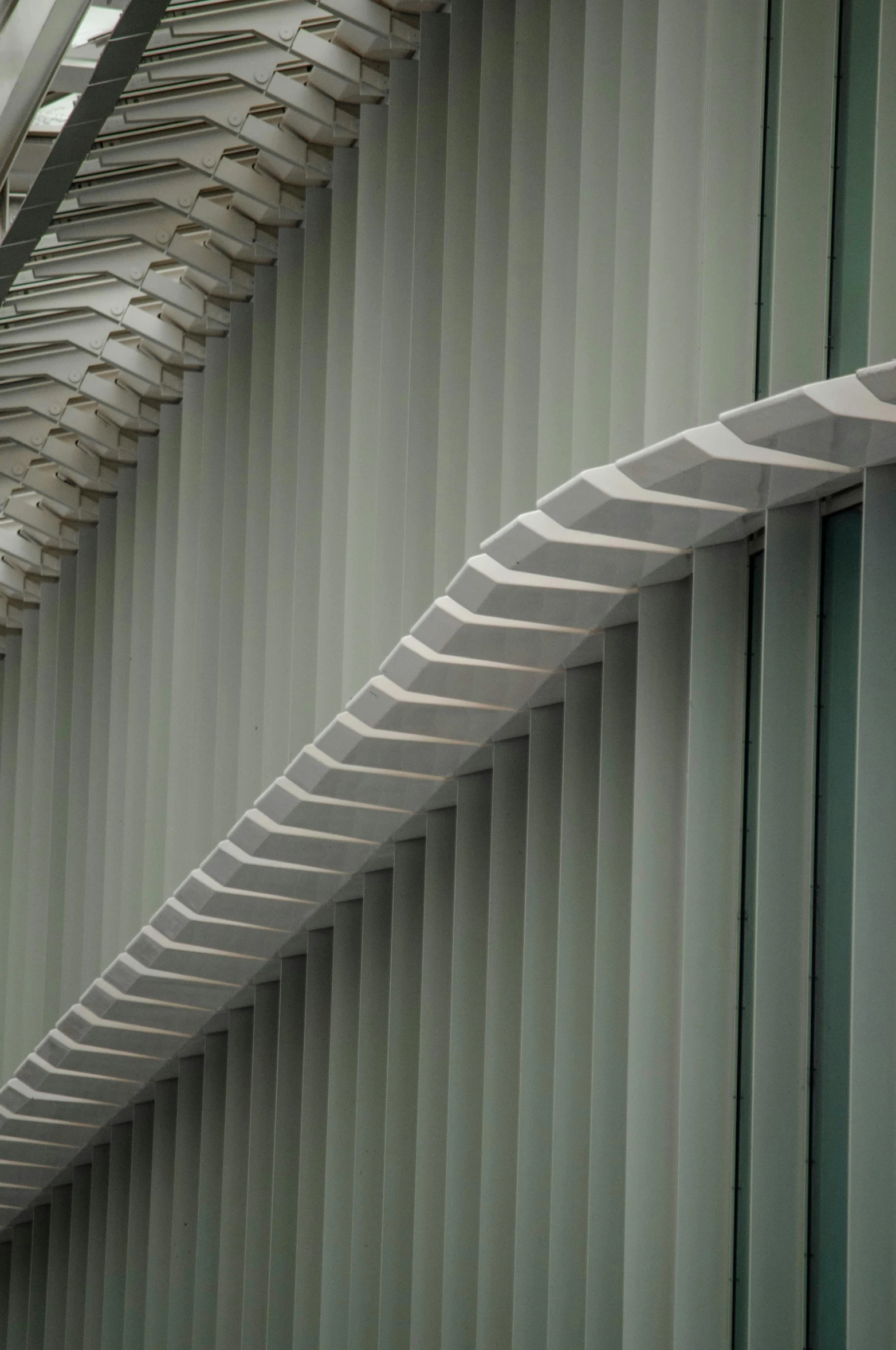 a close up view of metal bars on an awning