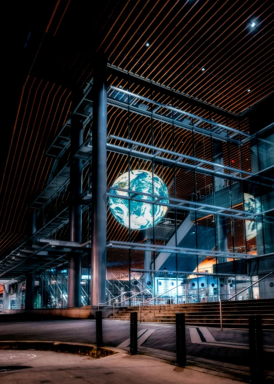 a dimly lit building is empty and with the lights on