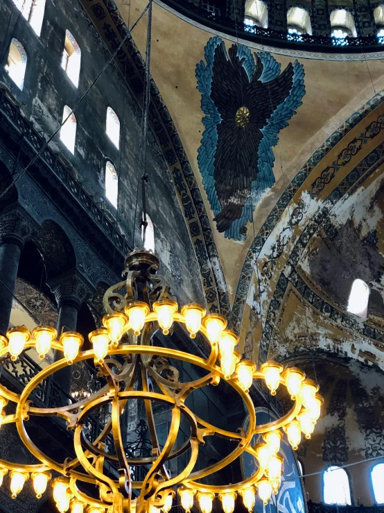 an ornate chandelier hanging in an intricate church