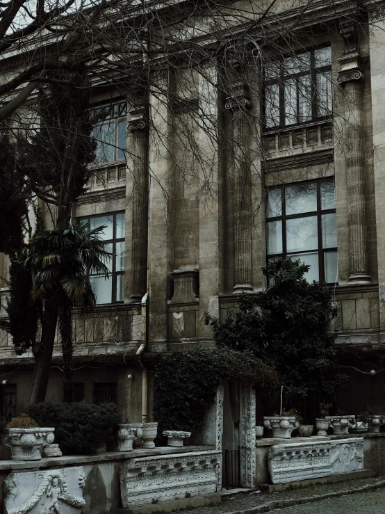 this is a building with three balconies on the side