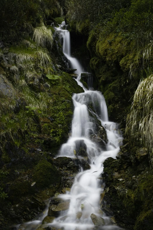 there is a long waterfall that runs down the hill