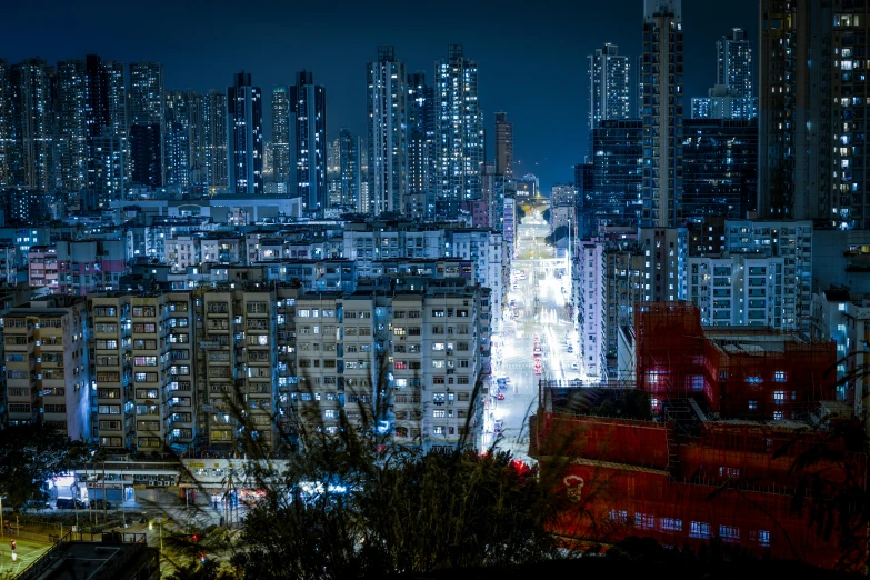 a city filled with tall buildings and night lighting
