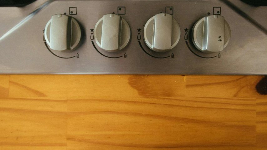 a group of s are on the top of a stove
