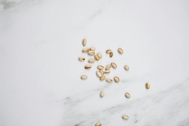 a group of nuts sit on the counter