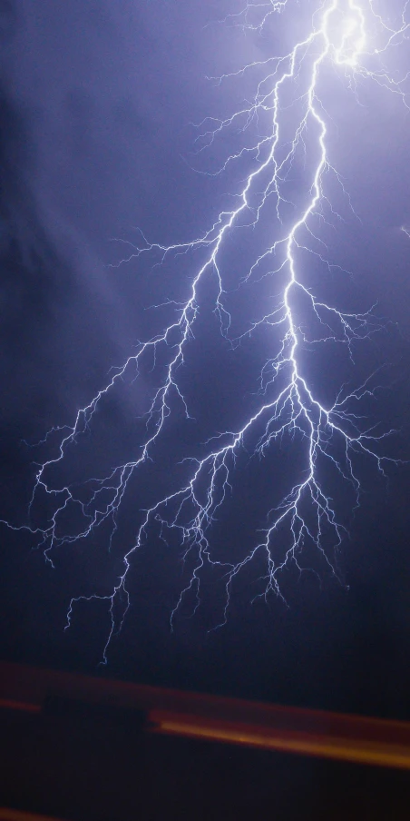 a lightning storm that is lit up in the sky