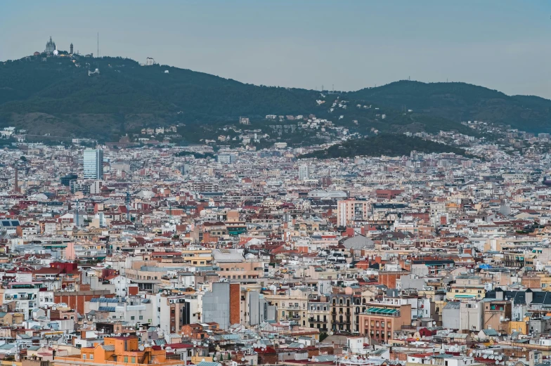 a po of a cityscape with mountains in the distance