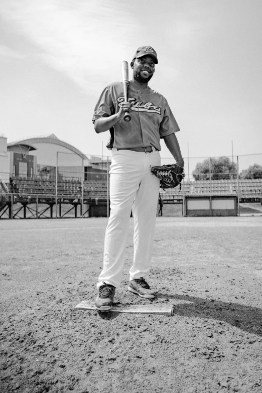 a baseball player standing on the pitchers mound