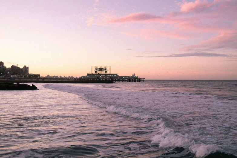 a couple of waves are coming towards the shore